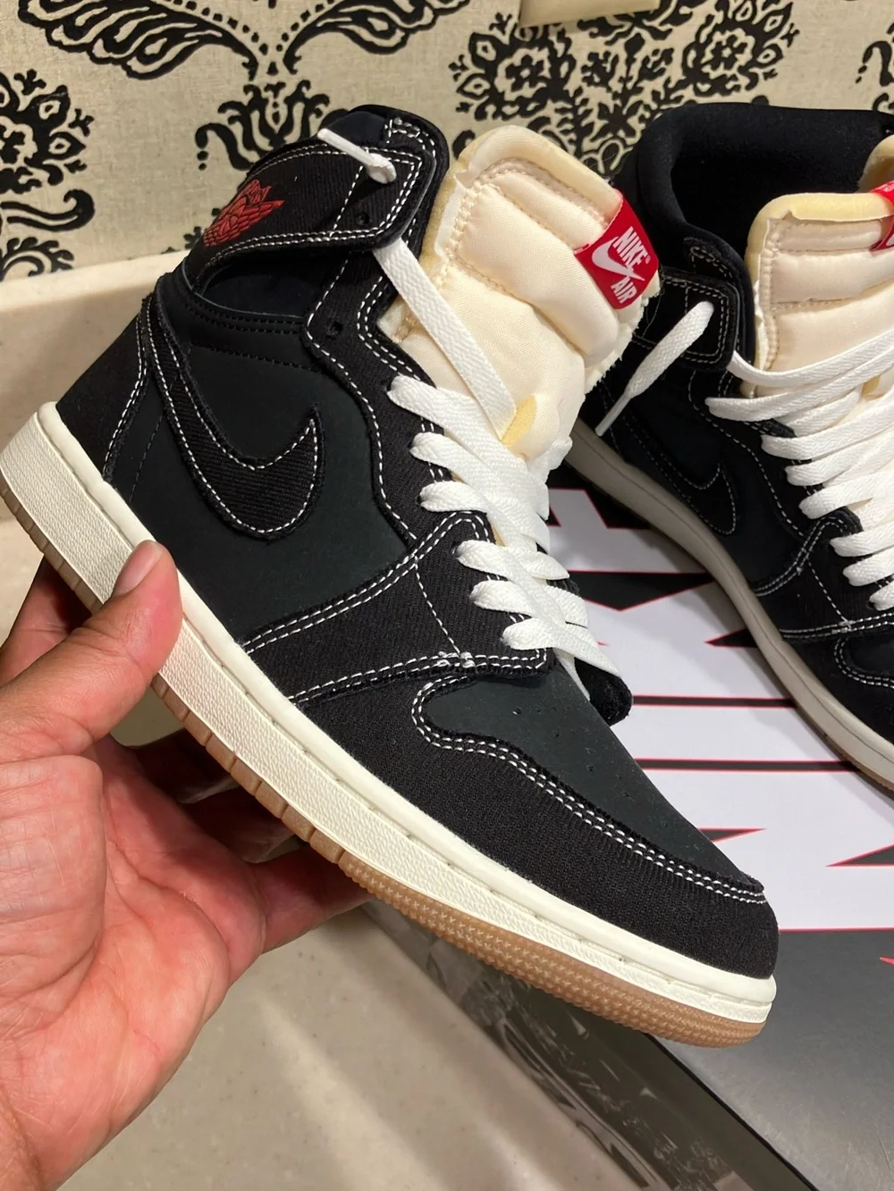 Jordan Black/White High-Top Sneakers with Red Logo